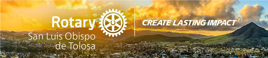 rotary club logo over sunset background